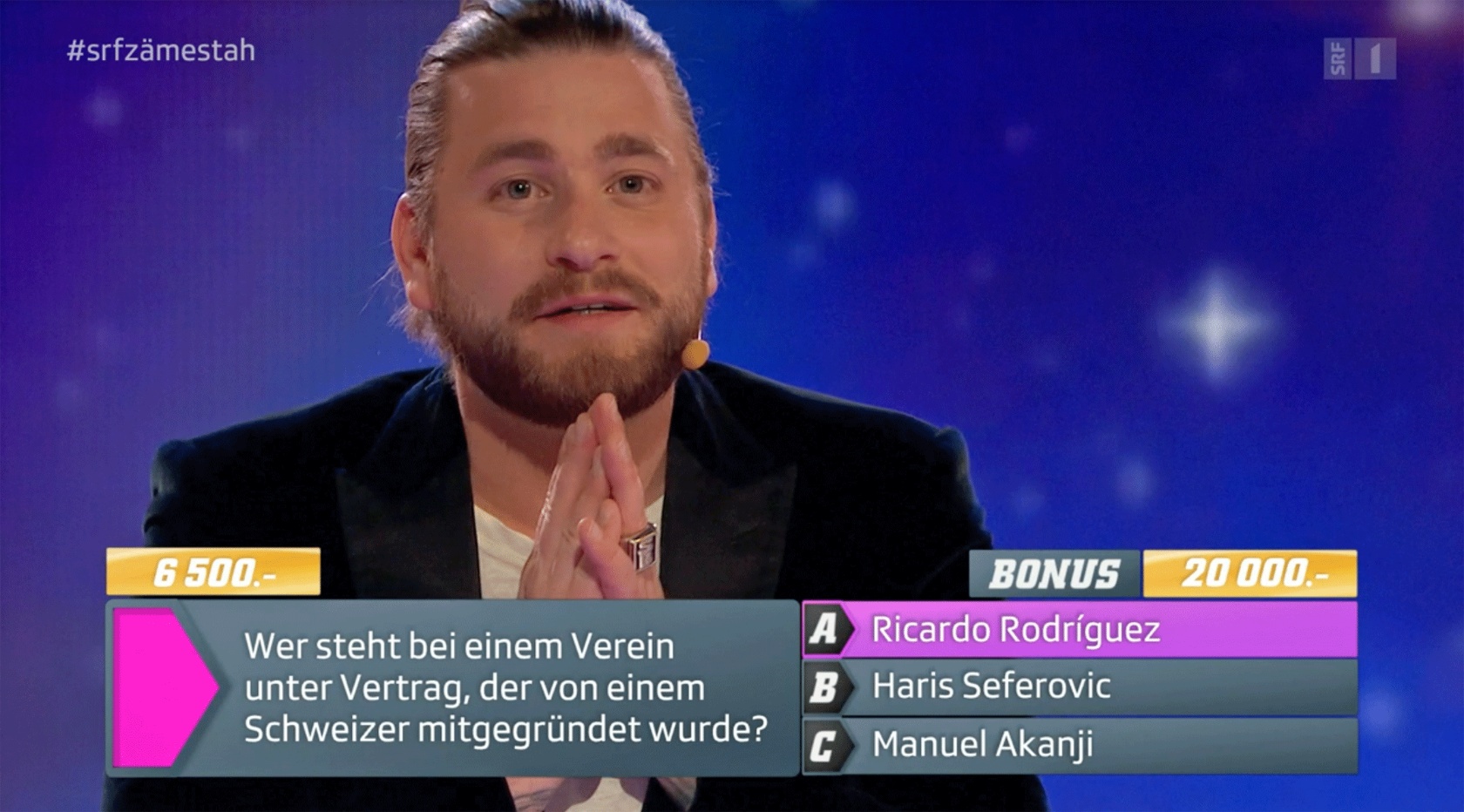 Baschi mit der Risikofrage bei «1 gegen 100» Spezial © SRF, Screenshot RFV Basel 2021